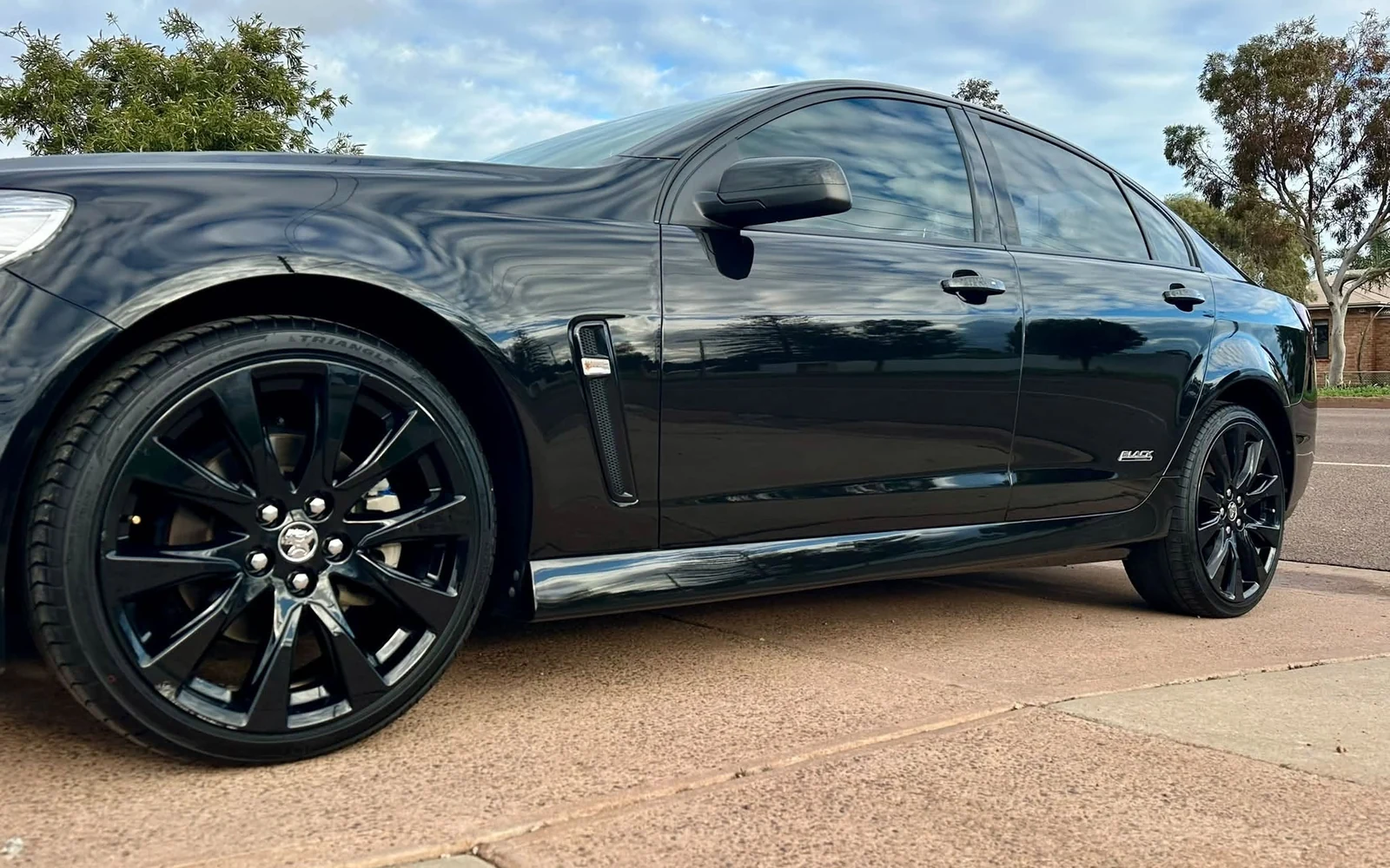 Freshly detailed black Holden sedan